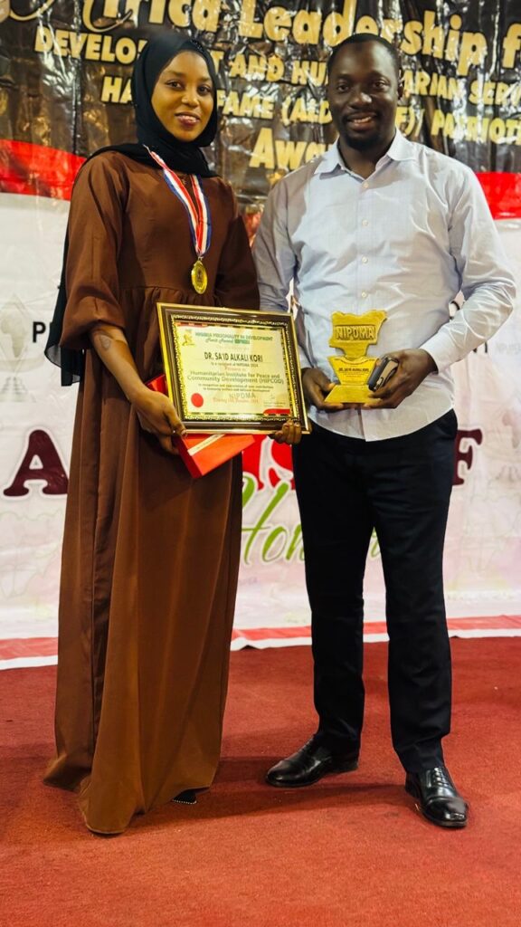 Thinklab Group Public Relations Officer, Fauziya Nasir receiving NIPDMA Award on Behalf of Dr. Said Kori