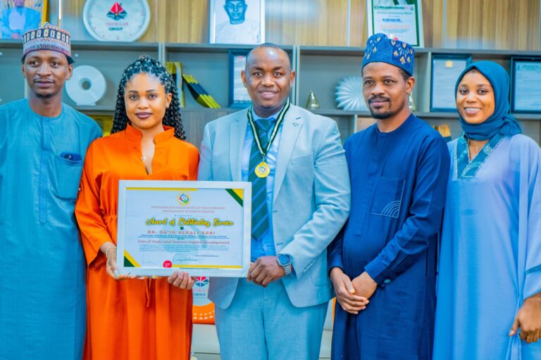 Postgraduate Procurement Management Students Honours Dr. Kori with Outstanding Service Award.