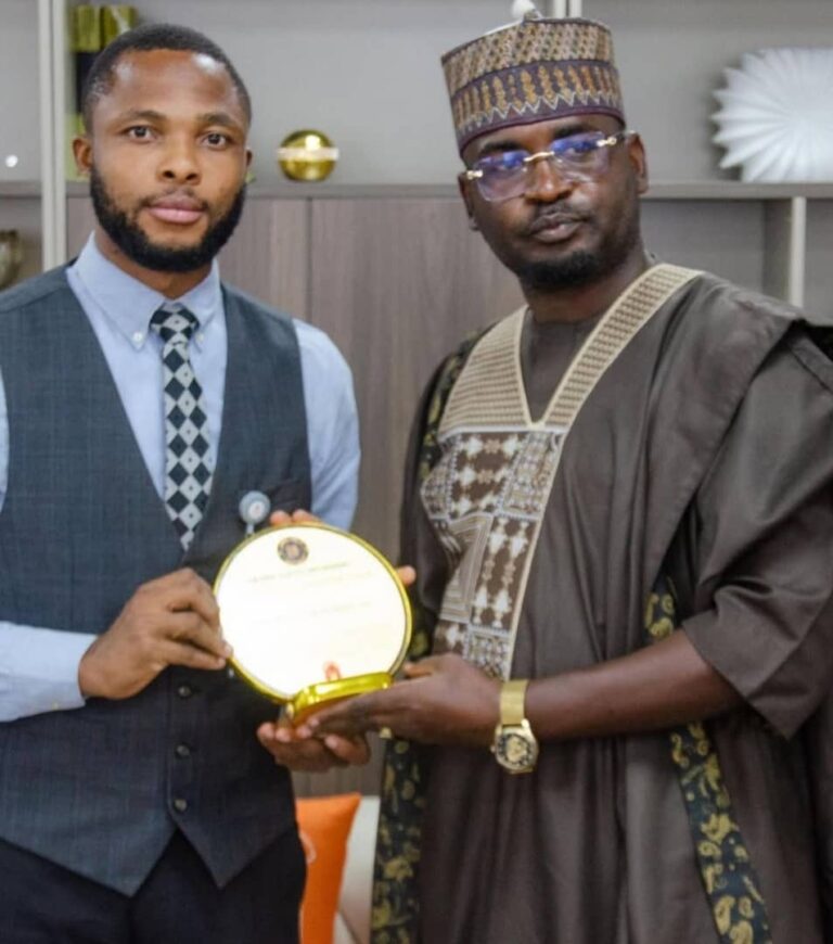 Former Communications Head Olufemi Dopamu receives “Pillar of Strength to Northern Youth” award from Arewa Youth Movement on behalf of Dr. Kori.